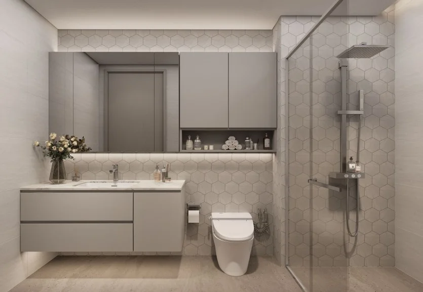 Wide-angle luxury bathroom interior at Golden Apple Residence with modern shower and vanity area