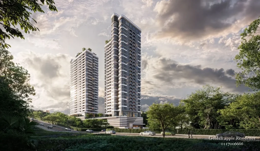 Twin luxury residential towers of Golden Apple Residence surrounded by greenery and modern urban infrastructure